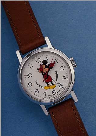 COMICUHR MICKEY MOUSE, WALT DISNEY PROD., SCHWEIZ UM 1975, METALL VERCHR., D. CA. 25 MM, STIFTENANKERW., STOßGES., LEDERB., EZ 2
