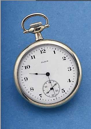 ELGIN HERRENTASCHENUHR, USA UM 1920, NICKELGEH. BEIDS. VERGL., BOD. U. GLASR. GE- SCHR., EMAILBL. SIGN. (VERGLASUNG RüCKSEITIG WOHL AUF ...