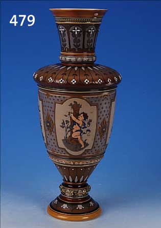 FUSSVASE, METTLACH, 1903, FEINSTEINZEUG, UMLAUFEND REICH GEERITZTER DEKOR, VIER KARTU- SCHEN MIT SPIELENDEN KINDERN, ABSTRAKT FLORAL VERZIERRT, ...