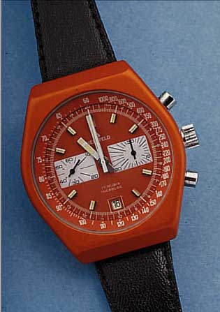 HERZFELD ARMBANDCHRONOGRAPH, SCHWEIZ UM 1974, METALLGEH. ORANGE MATT., EDELST.-BODEN GESCHR., BEI FERTIGST. WASSERGESCHR., MINERAL-FLACHGL., ...