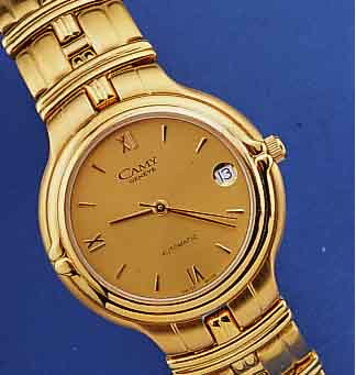 CAMY HERRENARMBANDUHR AUTOMATIK, SCHWEIZ UM 1994, EDELST. INCL. BAND, TEILW. HARTVERG., BEIDS. GEH. MINERALFLACHVERGL., ETA KAL. 2892-A2 (BEKANNT ...
