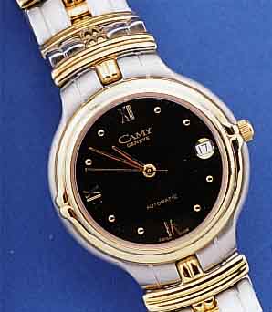 CAMY HERRENARMBANDUHR AUTOMATIK, SCHWEIZ UM 1994, EDELST. INCL. BAND, TEILW. HARTVERG., BEIDS. GEH. MINERALFLACHVERGL., ETA KAL. 2892-A2 (BEKANNT ...