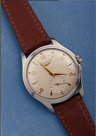 LONGINES HERRENARMBANDUHR, REF.-NR. 6263/4, SCHWEIZ UM 1952, EDELST., BODEN GESCHR., VERS.BLATT, AUßER LEDERB. U. KRONE ORIG.-ZUSTAND, WERK MATT ...