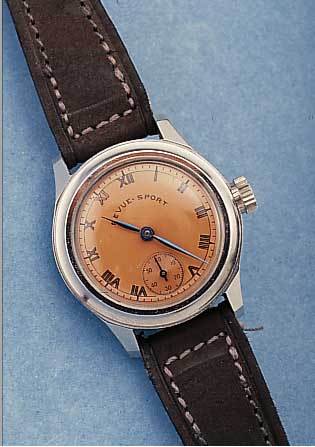 REVUE SPORT HERRENARMBANDUHR CONTRASID, REF.-NR. 116269, SCHWEIZ UM 1939, EDELST., KUPFERFARB. BLATT, 15 ST., HANDAUFZUGKAL. 56, ...