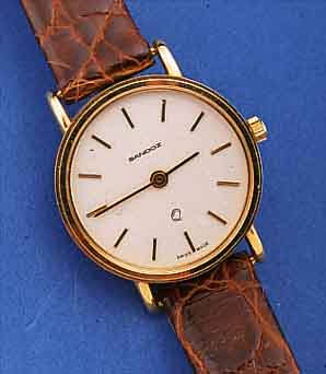 SANDOZ DAMENARMBANDUHR, SCHWEIZ UM 1990, GG 750/000, BODEN GEDR., MINERALFLACHGL., ORIG.-LEDERB. M. STIFTSCHL., HIGH-TECH-QUARTZ-W., UNGETR. ...