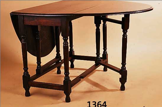 KLAPPTISCH, ENGLAND UM 1900, EICHE MASSIV, SECHS GEDRECHSELTE BEINE, ALTERSBEDINGTE GE- BRAUCHSSPUREN, CA. 71X101X152 CM