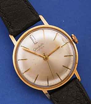 GLASHÜTTE HERRENARMBANDUHR, REF.-NR. 101148,DEUTSCHLAND UM 1965, METALL VERG., EDELST.- BODEN GEDR., ORIG.-BLATT ZUM RAND ZU L. FL., KAL. 70,1, ...