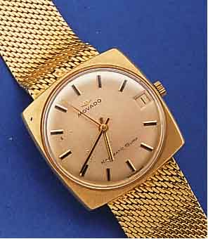 MOVADO HERRENGOLDBANDUHR KINGMATIC-SURF, REF.-NR. 9318, SCHWEIZ UM 1964, GG 750/000, CARREE-CAMBRE, BODEN GESCHR., INCL. GG-FLECHT-BAND, SAT., ...