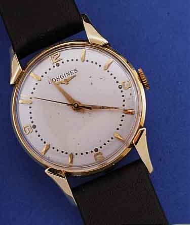 LONGINES HERRENARMBANDUHR, REF.-NR. 4886/3, SCHWEIZ/USA UM 1951, GG 585/000, BODEN GEDR., BLATT REST., AUFGEL. GOLD-STD.-ZEICHEN, GOLD- ZEIGER, ...