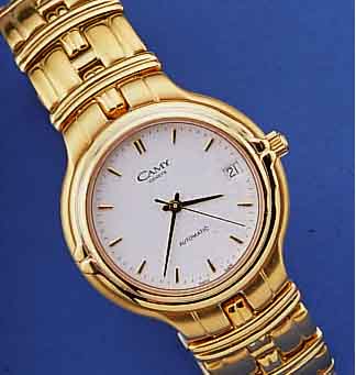 CAMY HERRENARMBANDUHR AUTOMATIK, REF.-NR. 5837, SCHWEIZ UM 1995, EDELST., GG-AUFL. INCL.EDELST.-BAND M. DOPPELTER, UNSICHTB. FALTSCHL.BEIDS. ...
