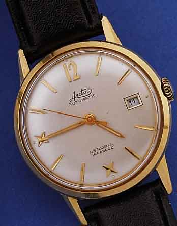 ARCTOS HERRENARMBANDUHR AUTOMATIK, SCHWEIZ UM 1955, GG 585/000, BODEN GESCHR., BEI FER- TIGST. WASSERGESCH., 25 ST., INCABL., ZENTRAL-SEK., DATUM, ...