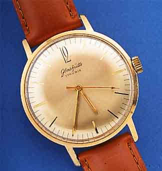 GLASHÜTTE HERRENARMBANDUHR, REF.-NR. 019365,DEUTSCHLAND UM 1965, METALL VERG., EDELST.- BODEN GEDR., 17 ST., HANDAUFZUGKAL. 70,1, RINGUNR., ...