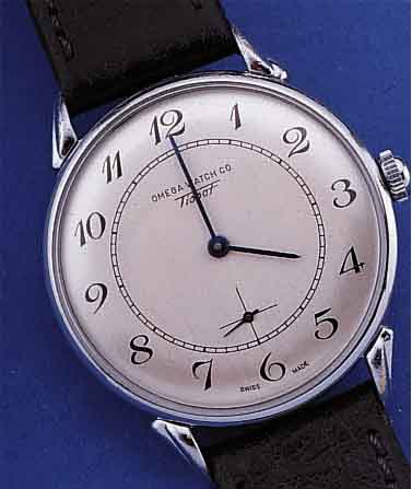 OMEGA/TISSOT WATCH CO ARMBANDUHR, REF.-NR. 6454-8, SCHWEIZ UM 1934, METALL HARTVERCHR., EDELST.-BODEN U. GLASR. GEDR., BLATT REST., 15 ST., ...