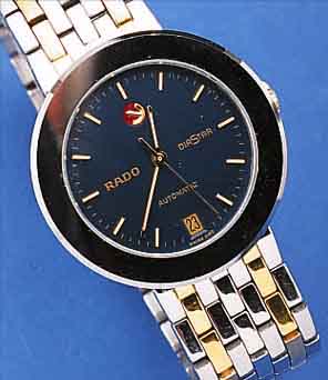 RADO HERRENARMBANDUHR AUTOMATIK, SCHWEIZ UM 1992, EDELST., EDELST.-BAND, ZWISCHENGL. DES BANDES IN GG, LüNETTE KRATZFEST LEG., SAPHIR- FLACHGL., ...