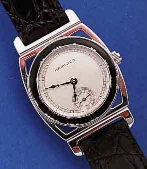 HAMILTON HERRENARMBANDUHR, USA/JAPAN UM 1992, METALL RHOD., EDELST.-BODEN GEDR., (NACHB. DER SOGEN. PIPING-ROCK), BEWEGL. BANDANST., ...