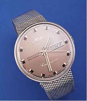 MIDO HERRENARMBANDUHR OCEANSTAR DATODAY/ KOMMANDER, SCHWEIZ UM 1990, EDELST.-EIN- SCHALENAUSF., EDELST.-FLECHTB., ORIG.-ETUI, BED.-ANL. U. ...