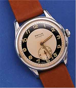 REVUE HERRENARMBANDUHR HAMMERAUTOMATIK, REF.-NR. 336391, SCHWEIZ UM 1950, EDELST., BODEN GESCHR., AUßER LEDERB. ORIG.-ZUSTAND, 19 ST., KAL. 80, ...