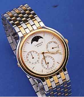 LASSALE HERRENARMBANDUHR VOLLKALENDER, REF.-NR. 7F69-6029, JAPAN UM 1987, EDELST. POL., TEILW. WIE BAND HARTVERG., DOPPELTE UNSICHTB. FALTSCHL., ...