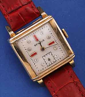 BENRUS ARMBANDUHR, SCHWEIZ/USA UM 1954, METALL M. GG-AUFL., BER., EDELST.-BODEN GEDR.,BLATT REST., STD.-ZEICHEN M. SCHMUCKSTEINBES.,RUNDANKERW., ...