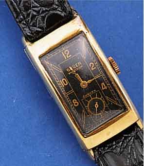 GRUEN HERRENARMBANDUHR CURVEX PRECISION, SCHWEIZ/USA UM 1938, GG-FILLED, BER. U. AN DEN BANDANST. REP. GEL., IN SICH GEW., MAßE CA. 43 X 19 ...