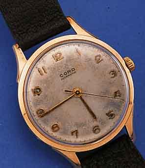 CORD HERRENARMBANDUHR HAMMERAUTOMATIK, REF.-NR. 173225, SCHWEIZ UM 1947, RG 750/000, BODEN U. GLASR. GEDR., ORIG.-BLATT FL., 17 ST., ...