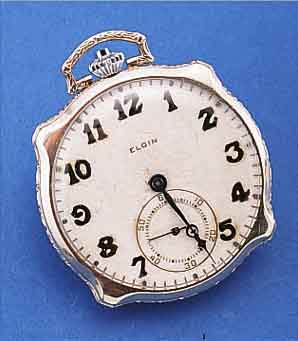 ELGIN HERRENTASCHENUHR LEPINE, USA UM 1925, WG-FILLED, AUFWEND. FORM, RAND WIE BüGEL TEIL-RELIEF., VERS. BLATT L. FL., BODEN U. GLASR. GEDR., 17 ...