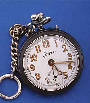 JUNGHANS TASCHENWECKER, DEUTSCHLAND UM 1924,BRüN. STAHLGEH., EMAILBL. (HANDBESCHR.), KAL. 7R, GEH- U. WECKWERK EIN ANTRIEB, NICKEL-KETTCHEN ...
