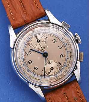 HUGA SA ARMBANDCHRONOGRAPH, SCHWEIZ UM 1940, METALL VERCHR., EDELST.-BODEN U. GLASR. GEDR., AUFGES. BANDANST., VERS. ORIG.-BLATT, ALTERSBED. ...