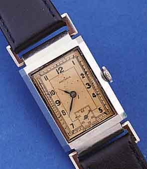 ARCADIA/FLEURIER WATCH CO ARMBANDUHR ART DECO, SCHWEIZ UM 1940, EDELST., BEWEGL. BANDANST., BODEN GEDR., RECT.-FORM IN SICH L. GEW., ...