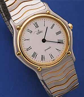 EBEL HERRENARMBANDUHR SPORT CLASSIC, SCHWEIZUM 1988, FLACHES EDELST.-GEH., EINSCHALENAUSF.KRONE, LüNETTE U. SCHRAUBEN IN GG, EMAILFARB. ...