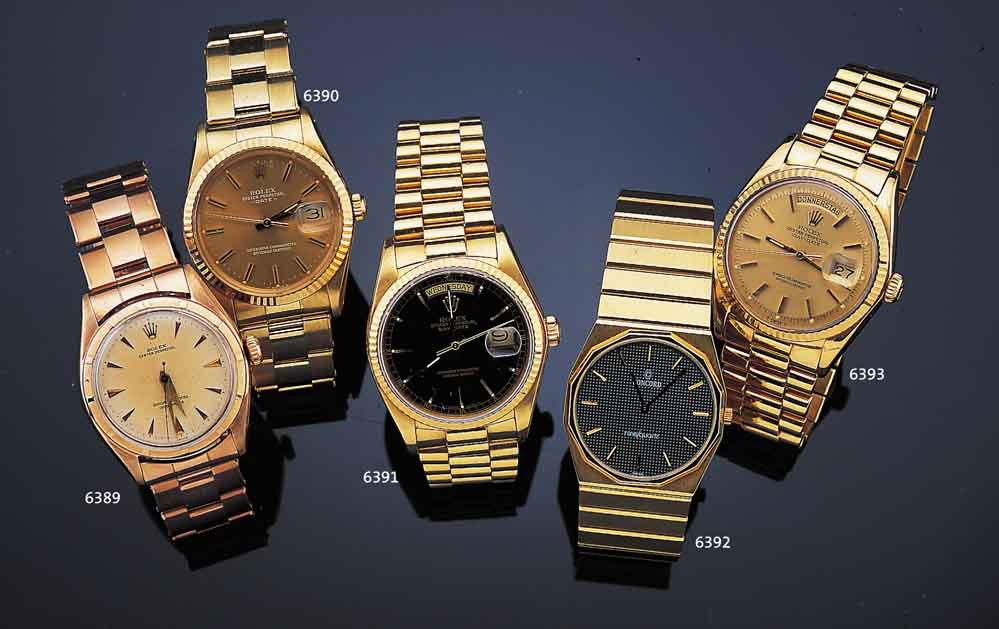 ROLEX HERRENARMBANDUHR DAYDATE, REF.-NR. 18038, SCHWEIZ UM 1979, GG 750/000-GEH. INCL. GG-PRäSIDENTBAND M. UNSICHTB. FALTSCHL., ...