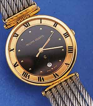 PHILIPPE CHARRIOL HERRENARMBANDUHR, SCHWEIZ UM 1992, METALLGEH. HARTVERG., EDELST.-BODEN GEDR., SAPHIRFLACHGL., 6-REIHIGES BAND AUS GEDR. STAHL, ...
