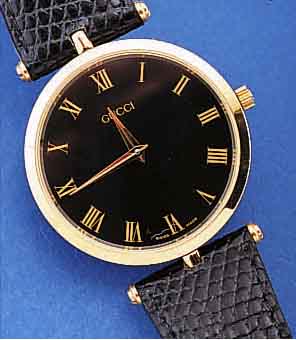 GUCCI HERRENARMBANDUHR, SCHWEIZ UM 1996, ORIG.-LEDERB. U. ETUI, UNGETR. LAGERW., HIGH-TECH-QUARTZW., EZ 1