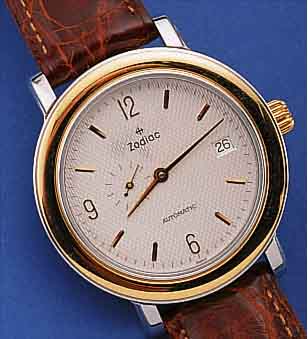 LE GUET HERRENARMBANDUHR AUTOMATIK, SCHWEIZ UM 1999, EDELST. POL., BODEN GEDR., BEIDS. VERGL. (AUF BODEN ROTORKONTROLLE U. SCHWUNG- BER. DER ...