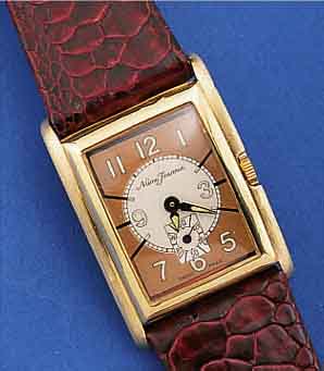 NUMA JEANNIN ARMBANDUHR, SCHWEIZ, GG 750/000GEH. UM 1937, BODEN GEDR., NUTZSP. üBERARB., WERK U. ZIFFERBL. AUS AKTUELLER PRODUKT., 17 ST., ...