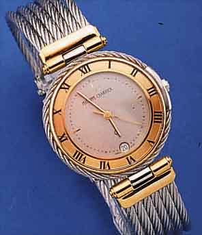 PHILIPPE CHARRIOL ARMBANDUHR, SCHWEIZ UM 1992, EDELST., GEH. AUßEN SOWIE BANDTEILE IN GEDR. STAHL, PATENT. FALTSCHL., SAPHIRFLACH- GL. M. VON ...