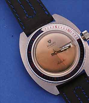 NIVADA HERREARMBANDUHR ANTARKTIS, REF.-NR. 67086, SCHWEIZ UM 1970, EDELST., BODEN U. KRONE GESCHR., TAUCHEREIGENSCHAFTEN, LüNETTE BEIDS. ...