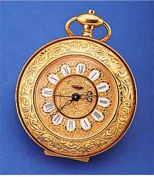 SCHWAB REISEWECKER IN FORM EINER GROßEN HER- RENTASCHENUHR, METALL RELIEF., VERG., AUF- STELLB., ORIG.-KASTEN, GARANTIEKARTE UNAUSGEF.GEH- U. ...