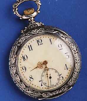 REGULUS REGULUS HERRENTASCHENUHR, 800ER SILBER, SCHWEIZ UM 1908, AUFWEND. RELIEFIERT, GEH.- RÄNDER M. FABELDARST., IM ZENTRUM DES BODENS ...