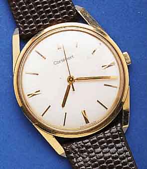 CORTEBCORTEBERT HERRENARMBANDUHR, GG 750/000, EINSCHALENAUSF., SCHWEIZ UM 1960, GET. A-WELLE VERS. BLATT, AUFGEL. GOLD-STD.-ZEICHEN, GOLD- ZEIGER, ...