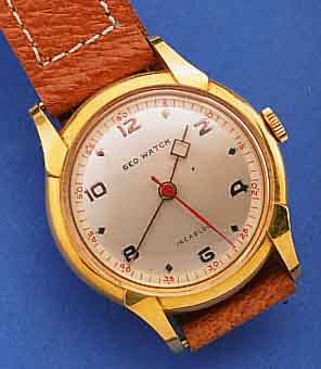 GEO WATCH HERRENARMBANDUHR, SCHWEIZ UM 1950, ZEITIDENT. LEDERB., METALL HARTVERG., EDELST.-BODEN GEDR., ORIG.-ZUSTAND M. AUFGES. BANDANST., ...
