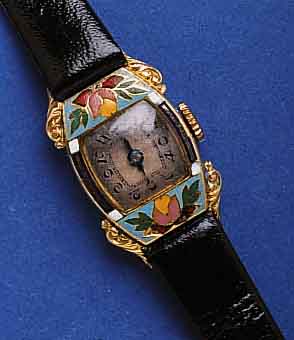 ESKAESKA DAMENARMBANDUHR, SCHWEIZ UM 1935, ART DECO, GG 750/000, LÜNETTE GOLDEMAIL. L. BESCH. ORIG.-BLATT VERS., FL., 15 ST., HANDAUFZUGKAL. ...