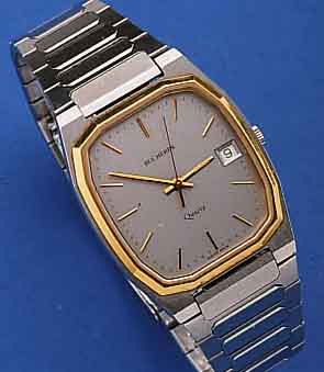 BUCHERER HERRENARMBANDUHR, REF.-NR. 955508, SCHWEIZ UM 1988, EDELST., FLACHE AUSF., EDEL- ST.-BAND, GG-LüNETTE, SAPHIRFLACHGL., HIGH- ...