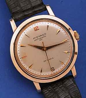 MOVADO HERRENARMBANDUHR AUTOMATIK, REF.-NR. 11202, SCHWEIZ UM 1952, EDELST., RG-HAUBE, BODEN GESCHR., MATT VERS. BLATT, MINIM. AL- TERSBED. ...