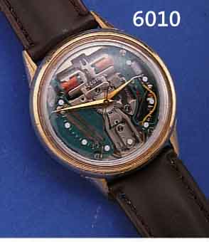 BULOVA ACCUTRON HERRENARMBANDUHR, SCHWEIZ UM1968, GG-FILLED, EDELST.-BODEN GESCHR., BEI FERTIGST. WASSERGESCH., BATTERIEFACH U. ZEI- GERST. IM ...
