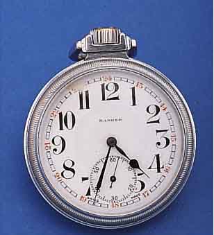 ASSA MILITäRTASCHENUHR, SCHWEIZ UM 1935, METALLGEH. VERCHR., BODEN U. GLASR. GESCHR., WOHL FüR DEN US-MARKT, EMAILBL. REP. BEI 11, BEZ. ...