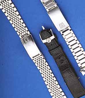 KONVOLUT FüR OMEGA HERRENARMBANDUHREN, 60ER JAHRE, 1X ETUI, 2X VERSCH. EDELST.-BäNDER (1X 1068, 1X 1162), 1X LEDERB. SEK., ABER ...