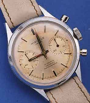 KIENZLE ARMBANDCHRONOGRAPH, DEUTSCHLAND/ SCHWEIZ UM 1964, METALL HARTVERCHR., EDELST.- BODEN GESCHR., VERS. BLATT FL., 30-MIN.- ...