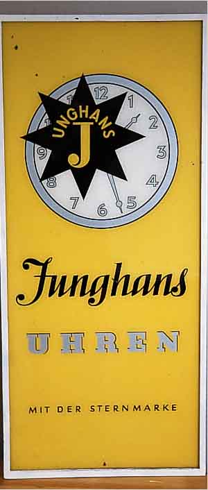 WERBESCHILD JUNGHANS UHREN, GLAS, ENDE 40ER-, ANFANG 50ER JAHRE, GELBGRUNDIG, SCHWARZE U. GRAUE BEMALUNG BZW. BESCHRIFTUNG, FARBAUFTRAG HINTER GLAS, ...