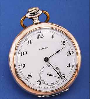 SAXONIA HERRENTASCHENUHR OFFEN, 800ER SILBERDEUTSCHLAND/SCHWEIZ UM 1912, RäNDER VERG., BER., EMAILBL. SIGN., FEIN HAARR. BEI 7, GE- BL. ...